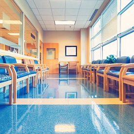 an office waiting room with chairs