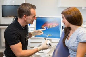 dentist making same-day dental crowns for a patient
